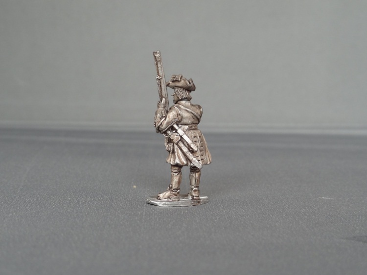 Musketeer of Spanish and Walloon Guards stood presenting