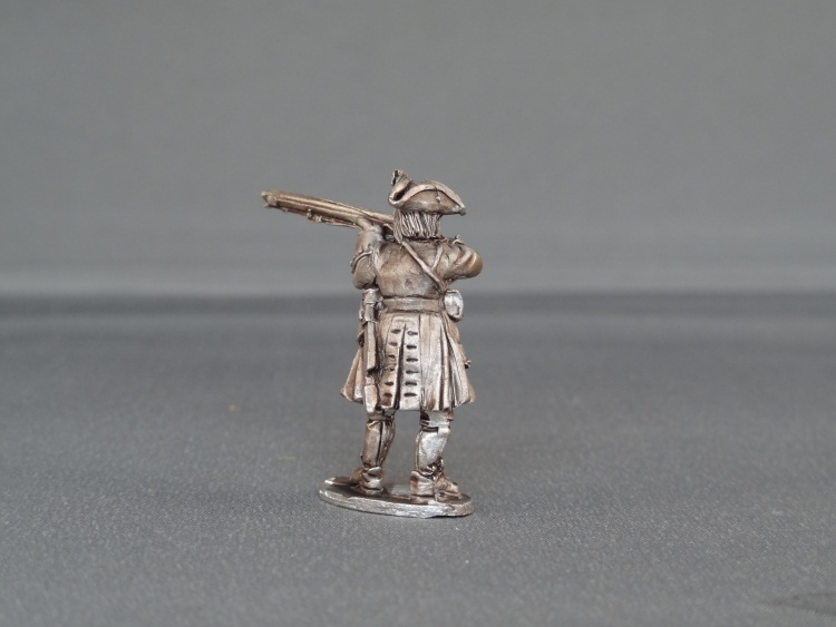 French musketeer stood giving fire