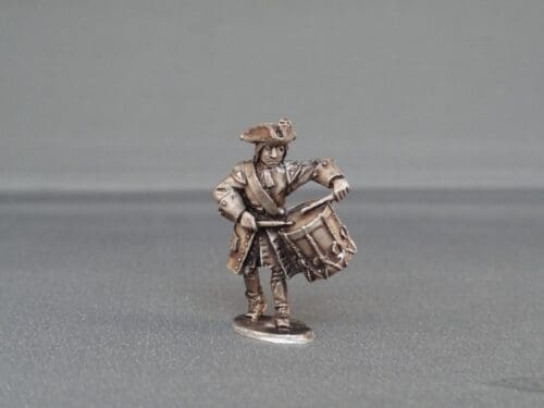 Drummer marching with cockade