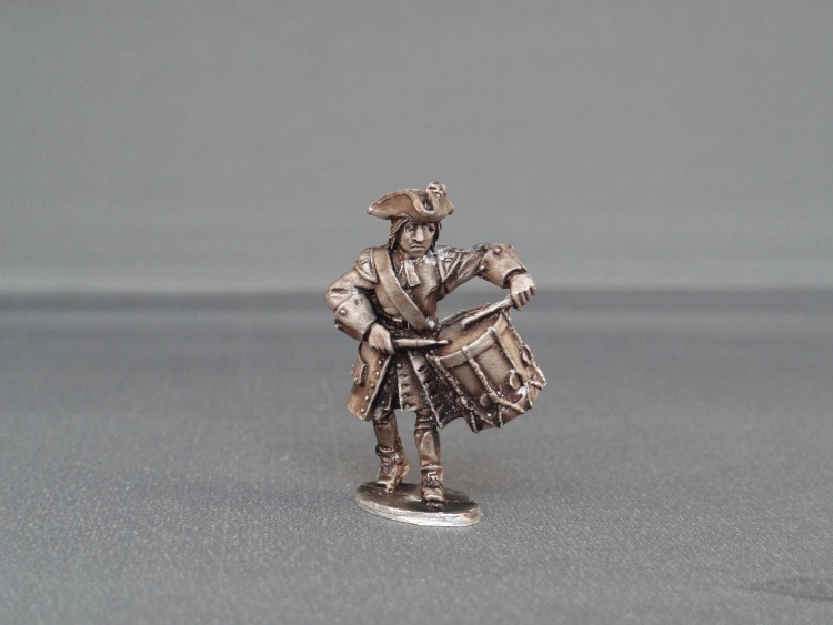 Drummer marching with cockade