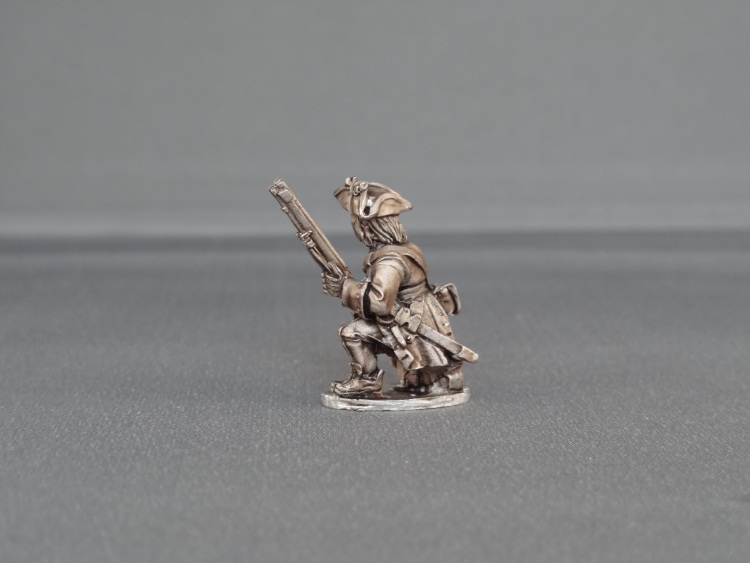 Musketeer kneeling with cockade